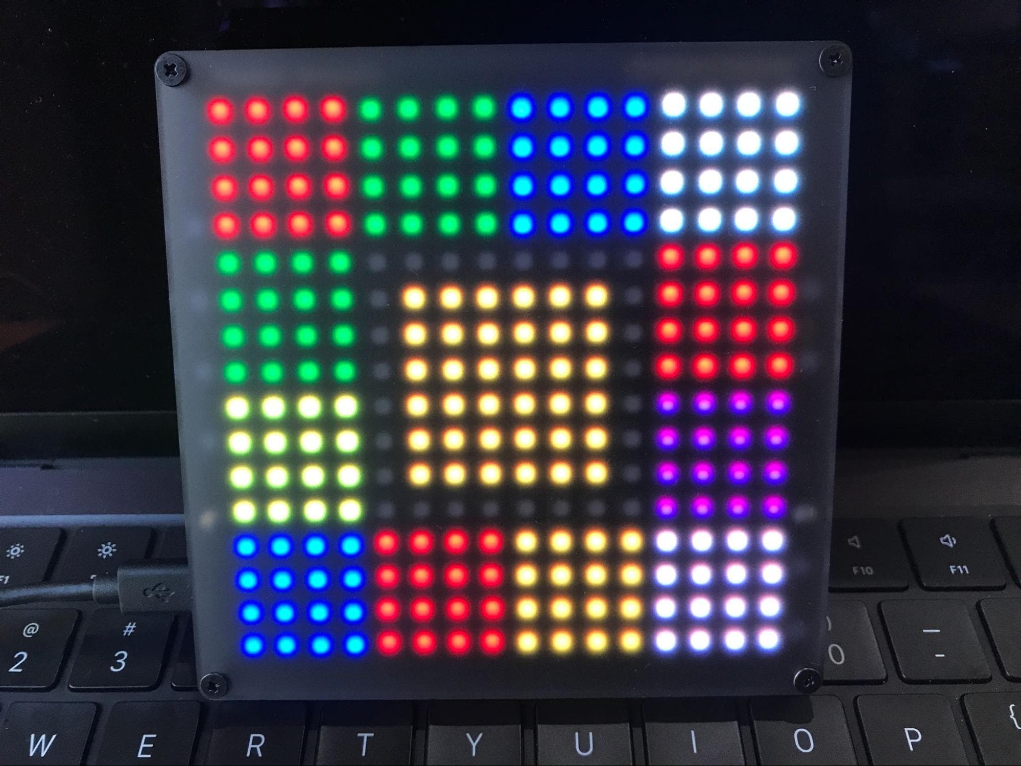 A photo of CheerLights installation that is an LED light display with red, blue, green, and yellow sections.